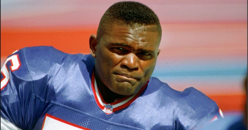 Linebacker Lawrence Taylor of the New York Giants looks on from the field before a game against the Tampa Bay Buccaneers at Giants Stadium on Sept. 12, 1993, in East Rutherford, New Jersey.