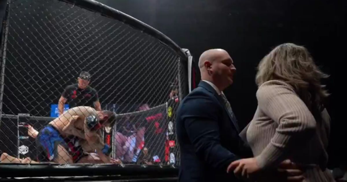 MMA Fighter's Wife Rushes Ring Begging for Bout to Be Stopped, Doesn't Realize Her Husband Is Locking In the Finishing Move