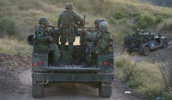 Mexican soldiers opened fire on a truck carrying immigrants from several countries, killing six.