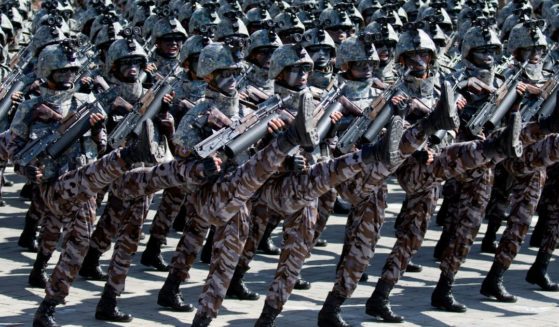 Soldiers march in a parade for the 70th anniversary of North Korea's founding day in Pyongyang, North Korea, on Sept. 9, 2018.