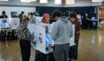 People vote at a polling location at Indianola Church of Christ in Columbus, Ohio, on Nov. 8, 2022.