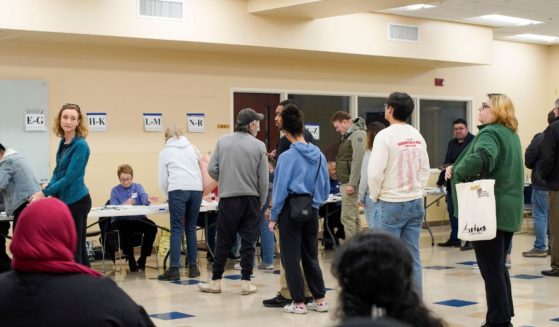 Voters check-in at a polling location in Columbus, Ohio, on Nov. 7, 2023.