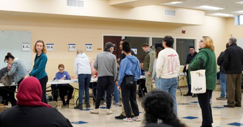 Voters check-in at a polling location in Columbus, Ohio, on Nov. 7, 2023.