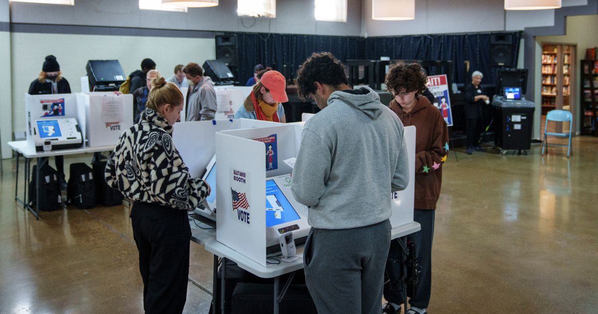 People vote at a polling location at Indianola Church of Christ in Columbus, Ohio, on Nov. 8, 2022.