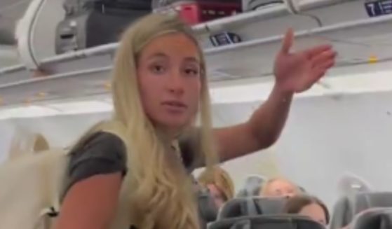 On a flight to Miami, Florida, a woman was accused of stealing another passenger's phone charger in a video that has since gone viral.