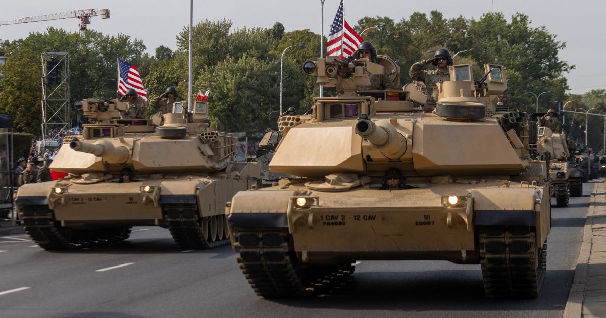 US Army Abrams tanks take part in a military parade in Warsaw on Polish Army Day, August 15, 2024, to commemorate the anniversary of the 1920 victory over Soviet Russia at the Battle of Warsaw during the Polish-Soviet War.