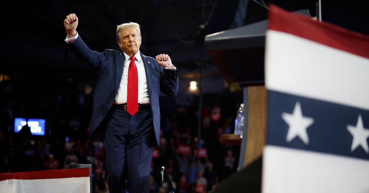 Republican presidential nominee, former U.S. President Donald Trump dances off stage at the conclusion of a campaign rally at the Santander Arena on October 09, 2024 in Reading, Pennsylvania.