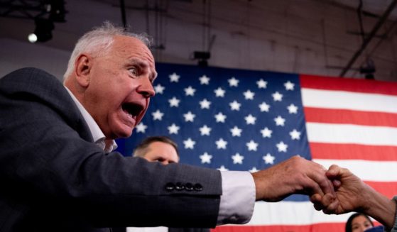 Democratic vice presidential candidate Minnesota Gov. Tim Walz greets supporters after speaking at a rally at York Exposition Center UPMC Arena on October 2, 2024 in York, Pennsylvania.