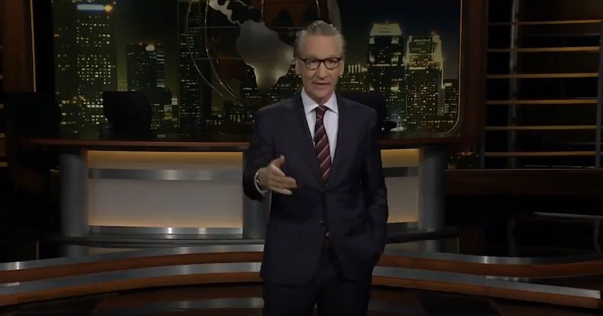 Bill Maher giving a monologue on his late night show.