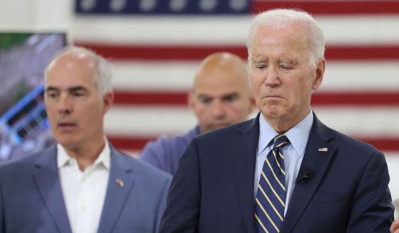 (L-R) US Senators Bob Casey (D-PA), John Fetterman (D-PA), US President Joe Biden, and Pennsylvania Governor Josh Shapiro attend a briefing on Interstate-95 highway emergency repair and reconstruction efforts, in Philadelphia, Pennsylvania, on June 17, 2023.