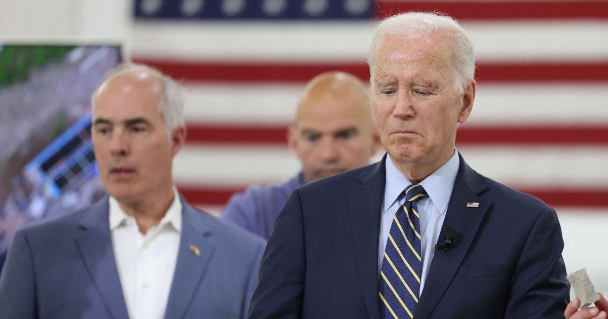 (L-R) US Senators Bob Casey (D-PA), John Fetterman (D-PA), US President Joe Biden, and Pennsylvania Governor Josh Shapiro attend a briefing on Interstate-95 highway emergency repair and reconstruction efforts, in Philadelphia, Pennsylvania, on June 17, 2023.