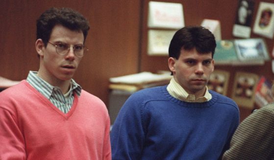 Erik Menendez (L) and his brother Lyle (R) listen during a pre-trial hearing, on December 29, 1992 in Los Angeles after the two pleaded innocent in the August 1989 shotgun deaths of their wealthy parents, Jose and Mary Louise Menendez of Beverly Hills, Calif.