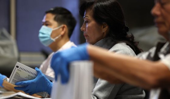 Workers sort mail in ballots at the Santa Clara County registrar of voters office on October 21, 2024 in San Jose, California. Early voting for the 2024 Presidential election began on October 7th in California.