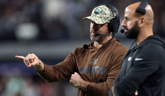 Quarterback Aaron Rodgers of the New York Jets talks with then-head coach Robert Saleh on the sidelines during a game against the Las Vegas Raiders at Allegiant Stadium on Nov. 12, 2023, in Las Vegas, Nevada.