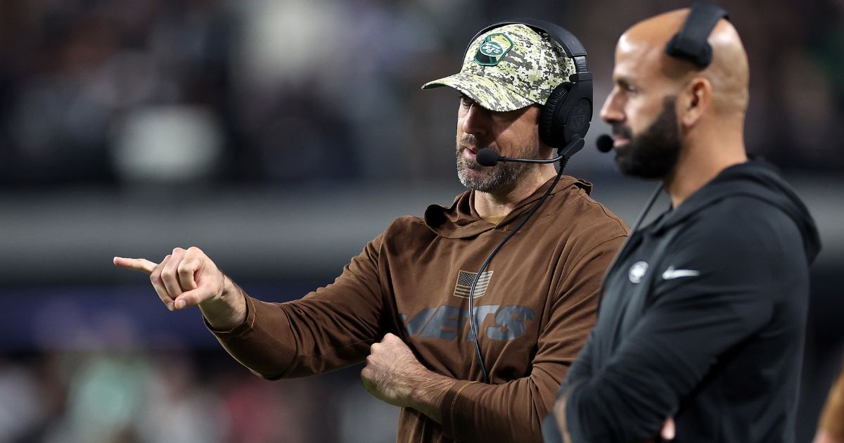 Quarterback Aaron Rodgers of the New York Jets talks with then-head coach Robert Saleh on the sidelines during a game against the Las Vegas Raiders at Allegiant Stadium on Nov. 12, 2023, in Las Vegas, Nevada.