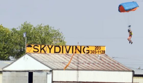 A parachutist lands at the Lodi Parachute Center shortly after another skydiver was injured in a jump on Sept. 14, 2017.