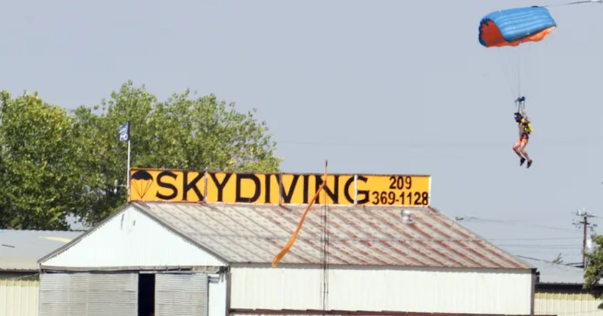 A parachutist lands at the Lodi Parachute Center shortly after another skydiver was injured in a jump on Sept. 14, 2017.