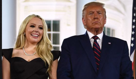 President Donald Trump is seen with daughter Tiffany Trump in a file photo from Aug. 27, 2020.