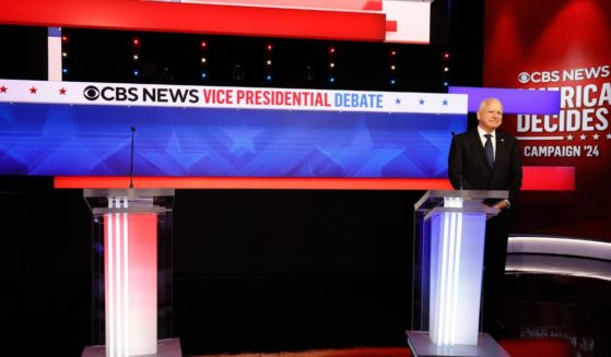 Democratic vice presidential candidate and Minnesota Gov. Tim Walz waits for the start of the vice presidential debate in New York City on Tuesday.