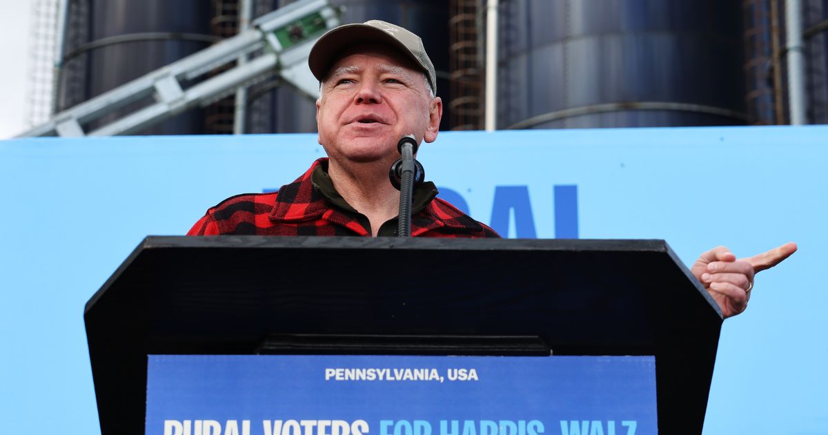 Gov. Tim Walz speaks during a campaign rally at Telesz Farms in Volant, Pennsylvania, on Tuesday. (