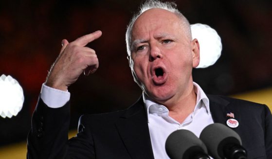 Democratic Vice Presidential candidate and Minnesota Gov. Tim Walz speaks during a campaign rally in Ann Arbor, Michigan, on Monday.