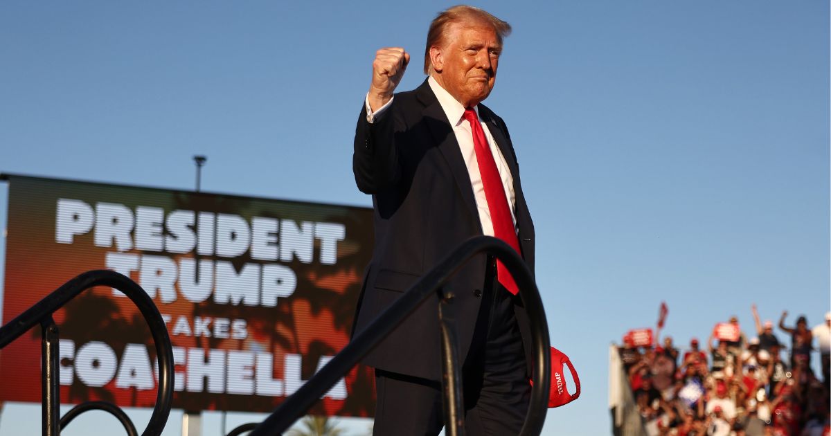 Former President Donald Trump greets supporters at a campaign rally in Coachella, California, on Saturday.