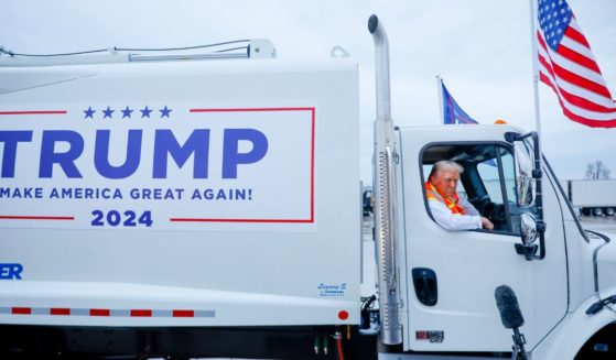 Former President Donald Trump campaigned in a garbage truck in Green Bay, Wisconsin, on Thursday, following comments from President Joe Biden, which called Trump supporters “garbage.”