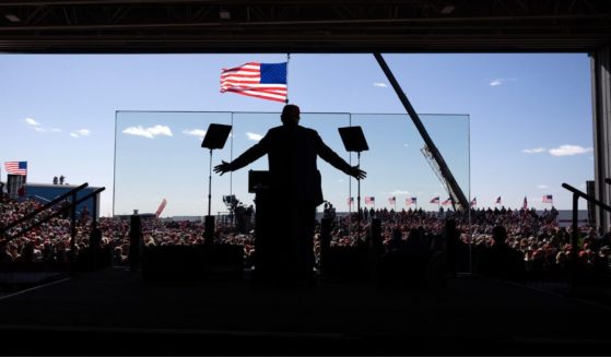 Former President Donald Trump speaks to supporters at a rally in Juneau, Wisconsin, on Sunday.