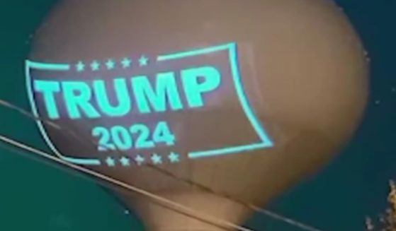 Since Friday, officials in Hanson, Massachusetts, have been trying to stop a "Trump 2024" projection from being displayed on the local water tower.