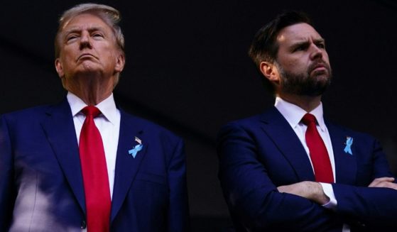 Former President Donald Trump, left, and Sen. J.D. Vance, right, attend a remembrance ceremony on the 23rd anniversary of the September 11 terror attack on the World Trade Center in New York City on Sept. 11.