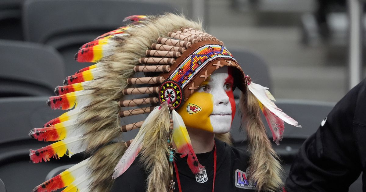 Young fan of the Kansas City Chiefs Holden Armenta waits for the start of Super Bowl LVIII between the Kansas City Chiefs and the San Francisco 49ers at Allegiant Stadium in Las Vegas, Nevada, on February 11, 2024.