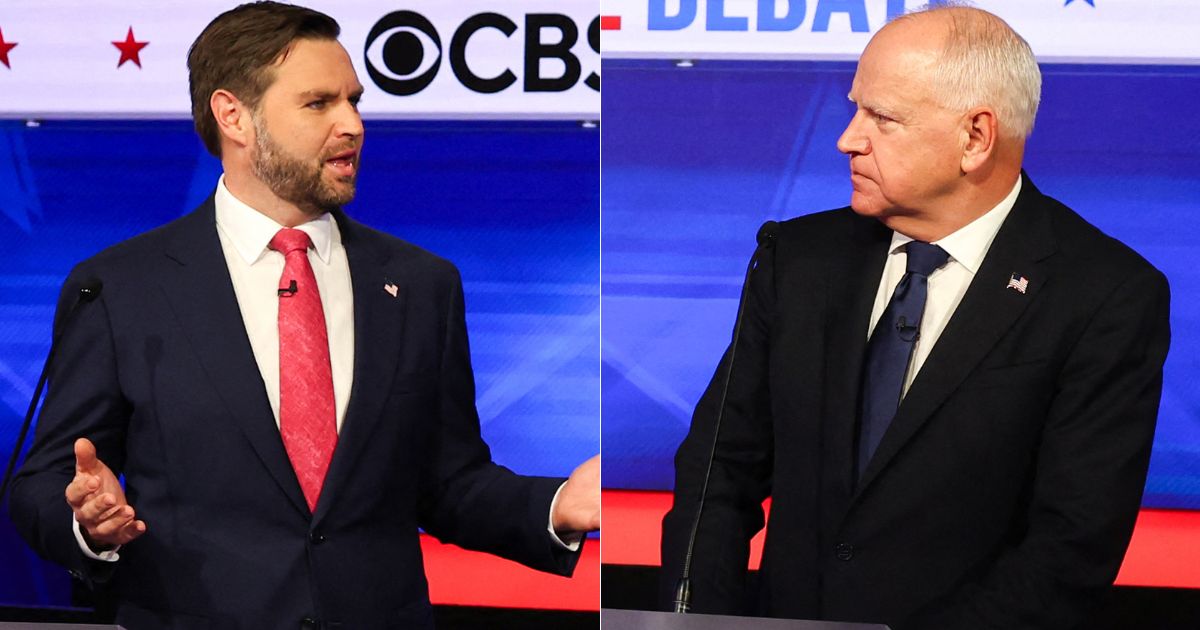 Sen. J.D. Vance speaks, as Gov. Tim Walz reacts, during the vice presidential debate in New York City on Tuesday.