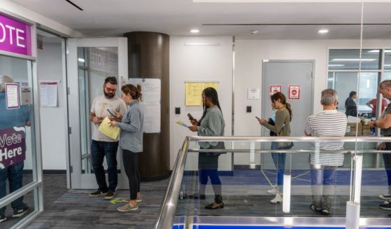 People line up to vote in Arlington, Virginia, on Sept. 20.