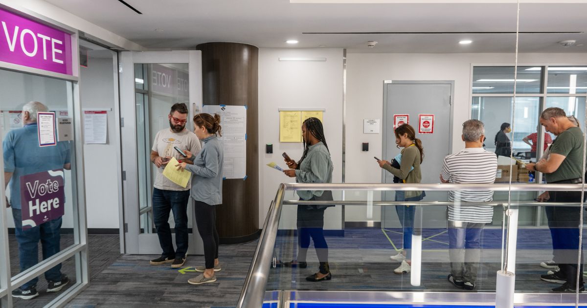 People line up to vote in Arlington, Virginia, on Sept. 20.