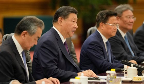 Chinese President Xi Jinping, second from left, and his delegation attend a meeting with Guinea-Bissau President Umaro Sissoco Embalo at the Great Hall of the People on July 10, 2024 in Beijing, China.