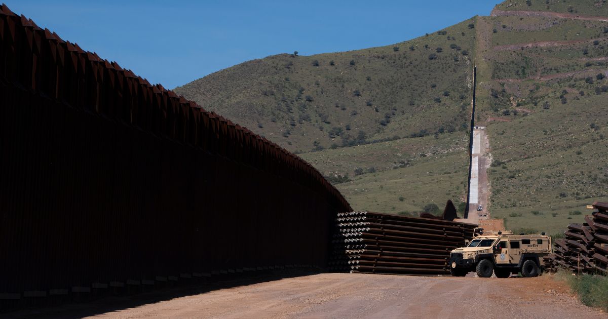 The U.S.-Mexico border fence is seen on August 22, 2024 south of Sierra Vista, Arizona.