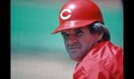 Pete Rose of the Cincinnati Reds looks on from the field during batting practice before a Major League Baseball game against the Pittsburgh Pirates at Three Rivers Stadium in 1985 in Pittsburgh, Pennsylvania.