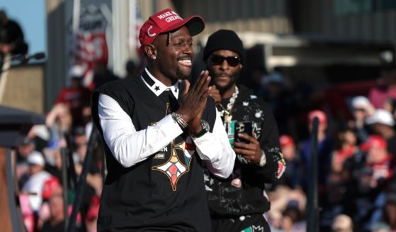 Former Pittsburgh Steelers players Antonio Brown (L) and Le'Veon Bell (R) leave the stage after Brown spoke in support of Republican presidential nominee, former U.S. President Donald Trump, during a campaign rally on October 19, 2024, in Latrobe, Pennsylvania.