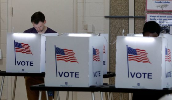 People vote in the Michigan primary election at Chrysler Elementary School in Detroit, Michigan, on March 10, 2020.