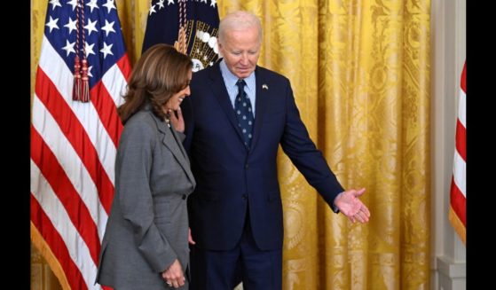 US President Joe Biden and US Vice President Kamala Harris attend an event on gun violence in the East Room of the White House in Washington, DC on September 26, 2024.