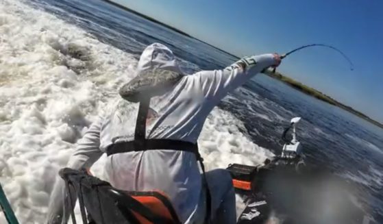 This TikTok screen shot shows a viral incident involving a kayaking fisherman and a jet skier.