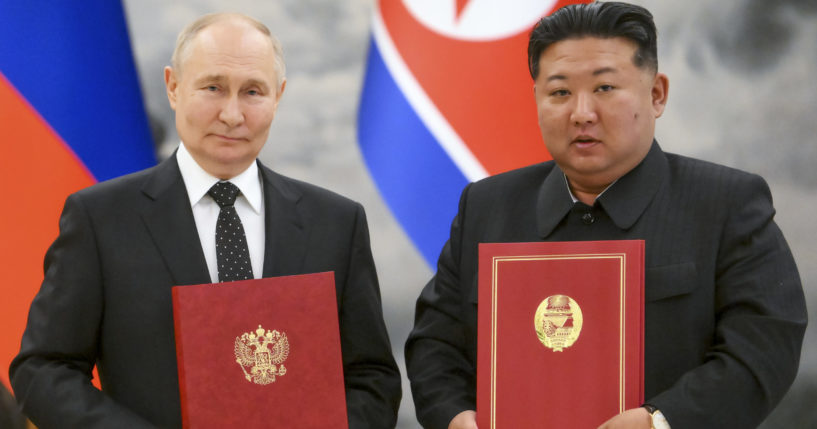 Russian President Vladimir Putin and North Korean Leader Kim Jon Un together in an Associated Press-provided photo.