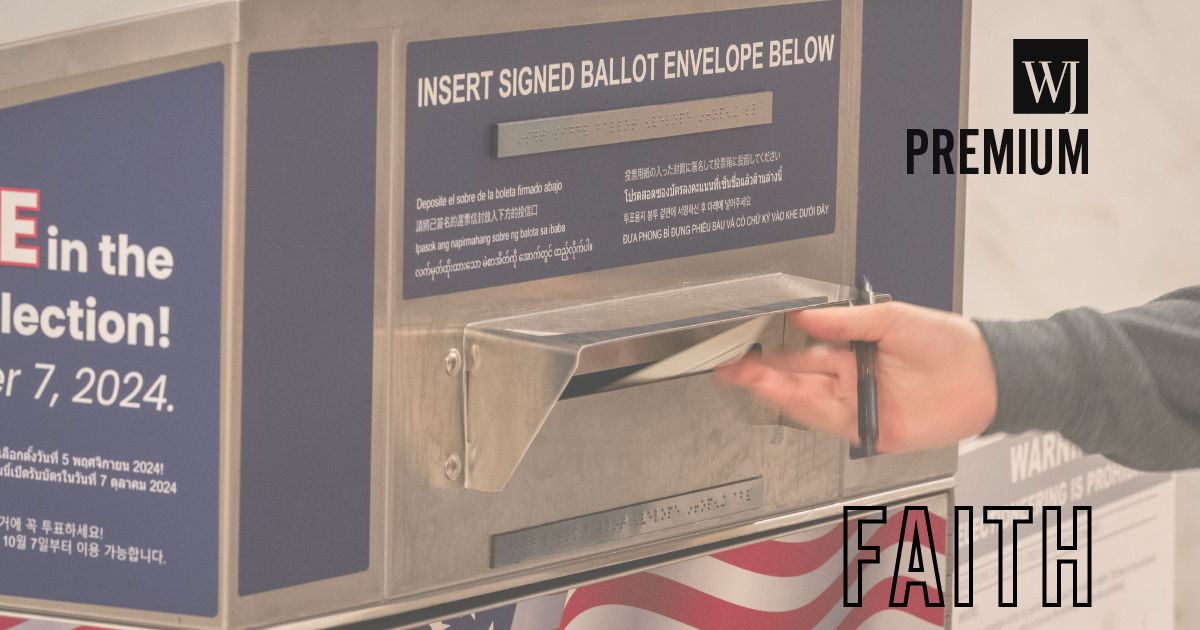 A voter drops off a ballot at an official ballot drop box at the San Francisco City Hall voting center in San Francisco, California, on Monday.