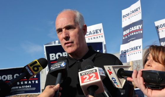 Sen. Bob Casey speaks with members of the media after arriving to vote in Scranton, Pennsylvania, on Nov. 5.