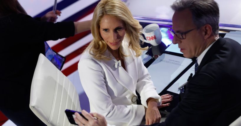 CNN hosts Jake Tapper, right, and Dana Bash, left, take a commercial break during the CNN Republican Presidential Primary Debate in Des Moines, Iowa, on Jan 10.