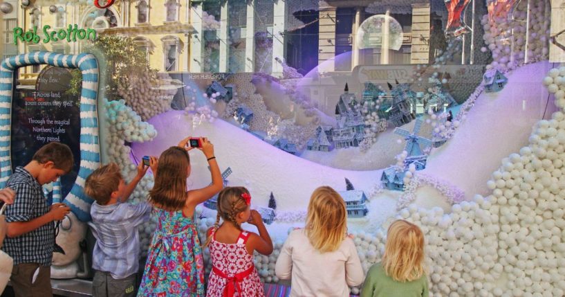 Children look at the Myer Christmas window display in Melbourne, Australia, on Dec. 20, 2012.