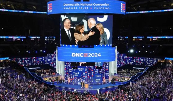 Vice President Kamala Harris, second from left, greets President Joe Biden, second from right, as first lady Jill Biden, right, and second gentleman Doug Emhoff, left, look on at the end of the first day of the Democratic National Convention in Chicago, Illinois, on Aug. 19.