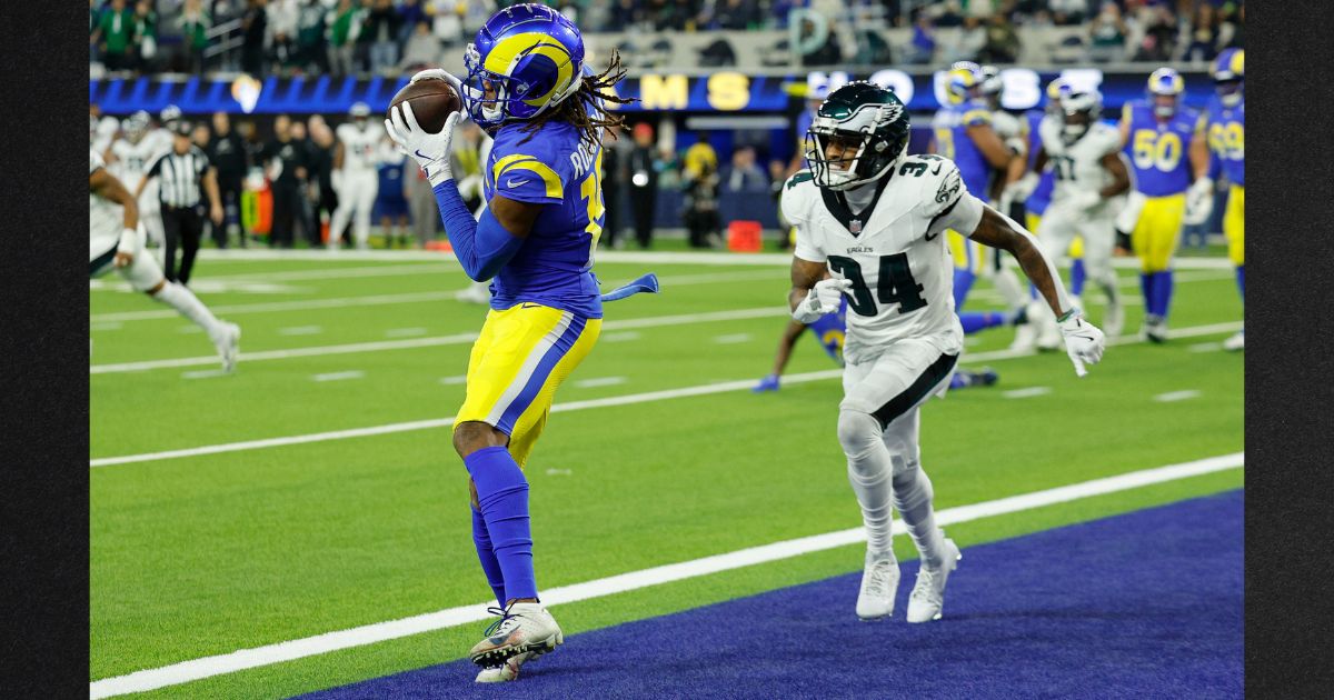 Demarcus Robinson of the Los Angeles Rams catches a touchdown pass against Isaiah Rodgers of the Philadelphia Eagles during the third quarter at SoFi Stadium Sunday in Inglewood, California.