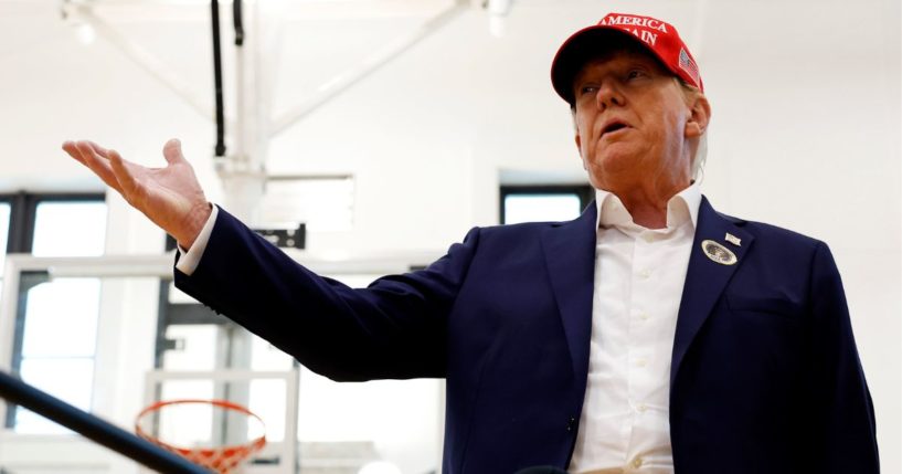 Former President Donald Trump speaks to reporters after casting his ballot in Palm Beach, Florida, on Tuesday.