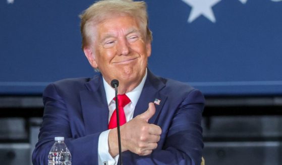 Former President Donald Trump gives a thumbs up during a Hispanic roundtable at Beauty Society in Las Vegas, Nevada, on Oct. 12.